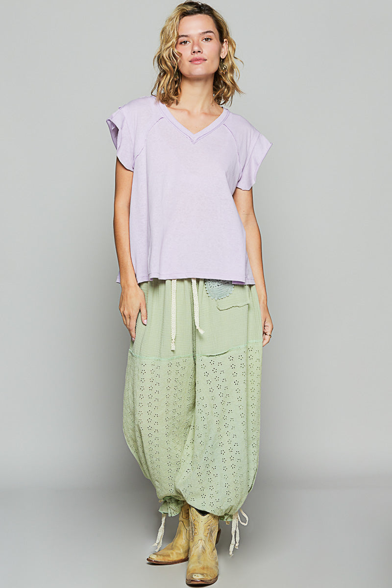 lavender sleeveless shirt