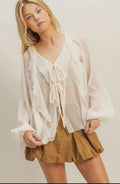 Chic textured tie front blouse